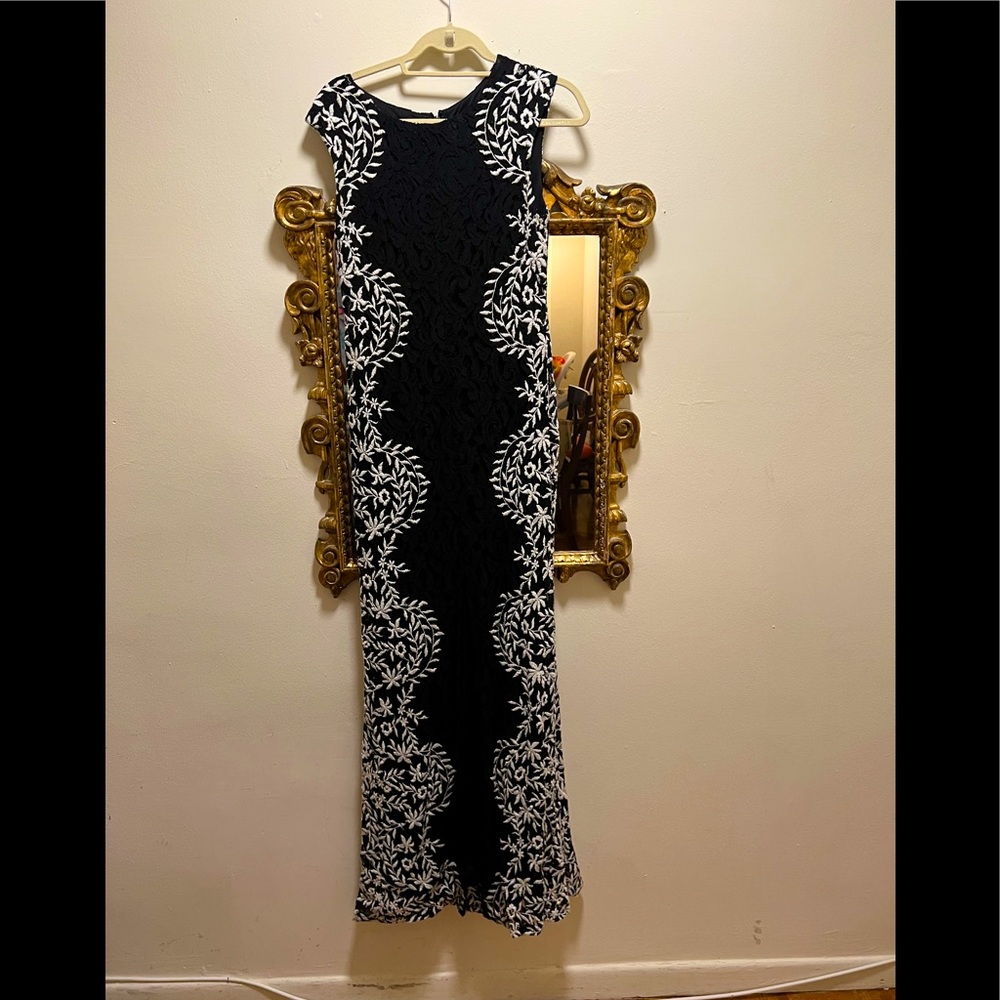 Betsy Adams size 8 black evening gown with white design down the sides